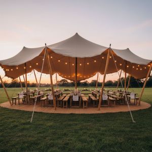 6.5m by 6.5m Sand Coloured Stretch Tent with Coir Matting Flooring and Eucalyptus Wooden Poles